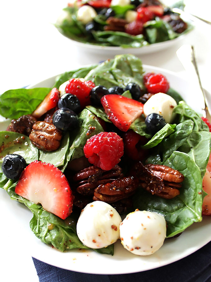 Berry Spinach Salad with Honey mustard vinniagrette. Satisfying salad for lunch or dinner. Bursting with summterime berries. #vegetarian #glutenfree #salad