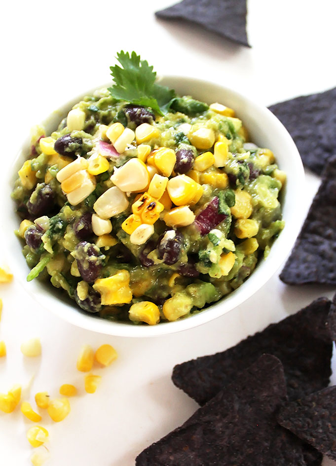 Grilled Corn and Black Bean Guacamole. Only requires 8 ingredients. Simple to make. Screams summer! #vegan #Glutenfree #guacamole | robustrecipes.com