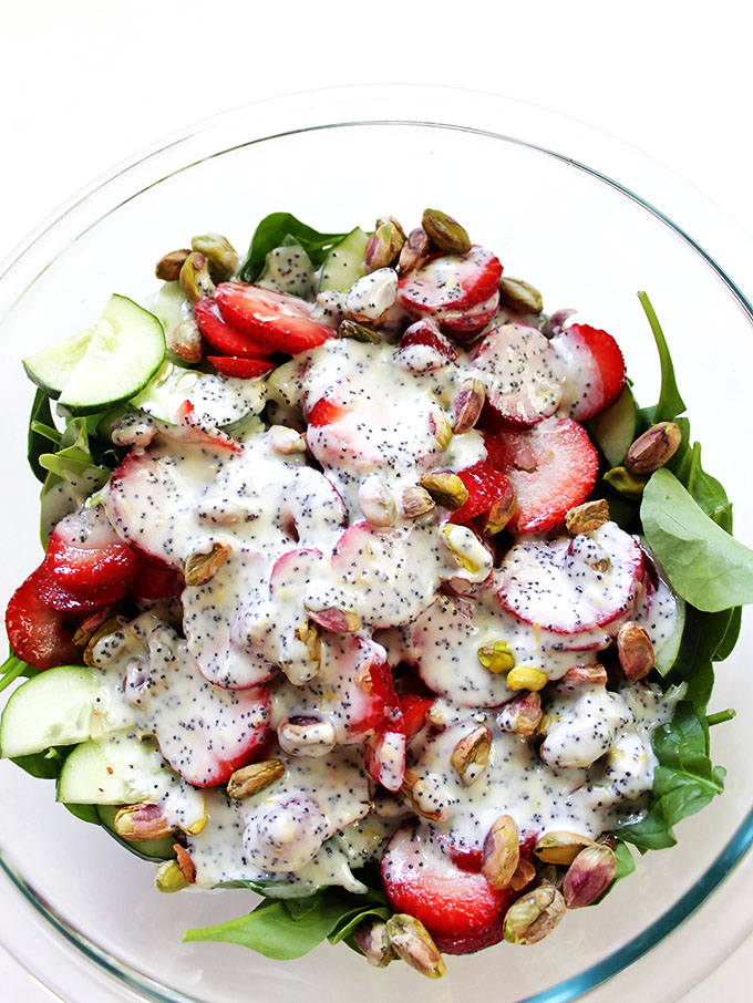 strawberry cucumber salad with creamy lemon poppy seed dressing. Simple, quick and easy to make. The perfect side salad | robustrecipes.com