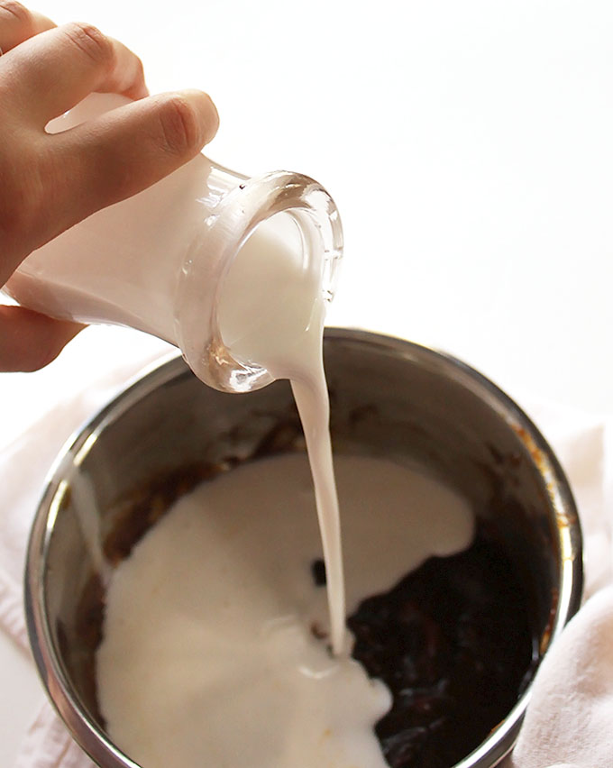 Coconut Pumpkin Spice Latte! Getting ready to heat up the coconut milk! #vegan |robustrecipes.com
