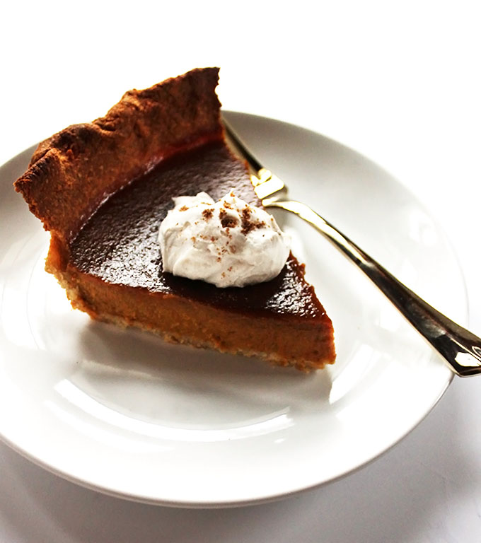 Gluten Free Pumpkin Pie! Crust made with coconut flakes and oat flour. Creamy, smooth pumpkin pie filling. Perfect for fall time.
