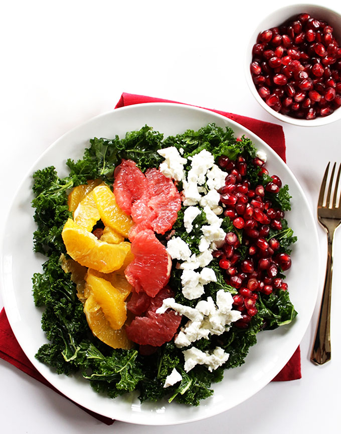 Winter Kale Salad. A healthy salad with cirtrus fruites, and pomegranates. Perfect as a side salad!