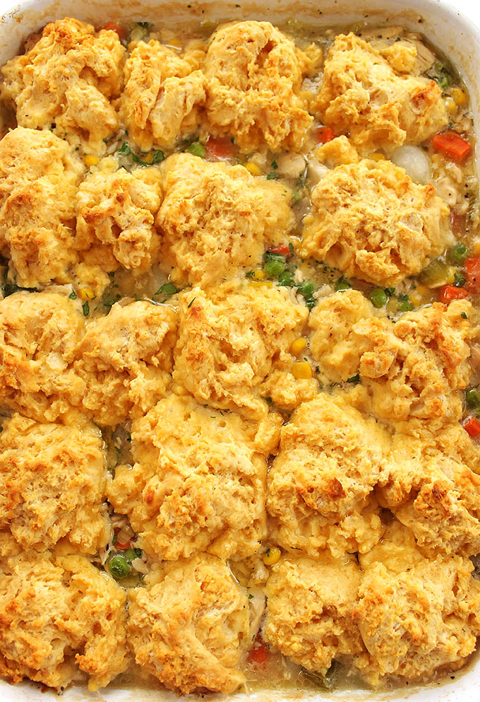 Chicken Pot Pie Casserole. Loaded with veggies, and topped with gluten free cornbread biscuits!
