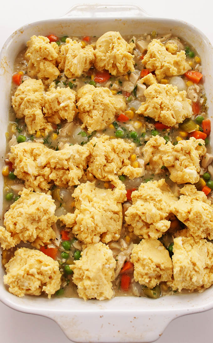 Chicken Pot Pie Casserole. The perfect comfort food. Bursting with veggies, flavor and all topped with a buttery gluten free cornbread bisuit!
