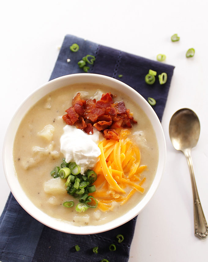 Healthier Loaded Baked Potato Soup - Pureed cauliflower instead of heavy cream. So rich and yummy! We LOVE this recipe for wintertime! Gluten Free! | robustrecipes.com