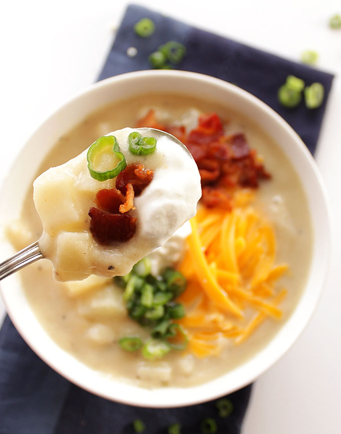 Healthier Loaded Baked Potato Soup - The secret ingredient is pureed cauliflower. So rich & creamy. Topped with BACON! Gluten free! | robustrecipes.com