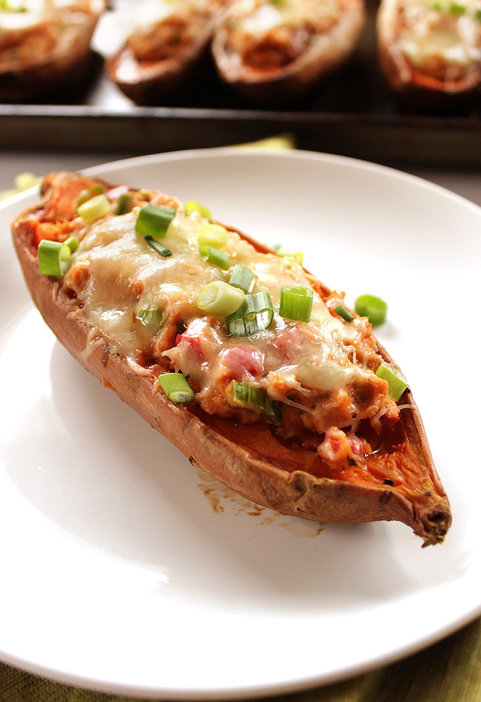 Sweet Potato Salmon Melts - Baked Sweet potatoes stuffed with creamy salmon salad and topped with melted cheese! An EASY recipe that's perfect for any weeknight meal. So nutritious! Gluten Free | robustrecipes.com
