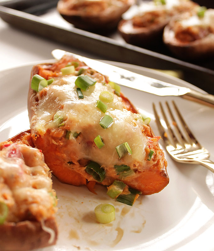 Sweet Potato Salmon Melts - Sweet potatoes stuffed with salmon salad and topped with melted cheese! An EASY recipe that's perfect for any weeknight. Gluten Free | robustrecipes.com