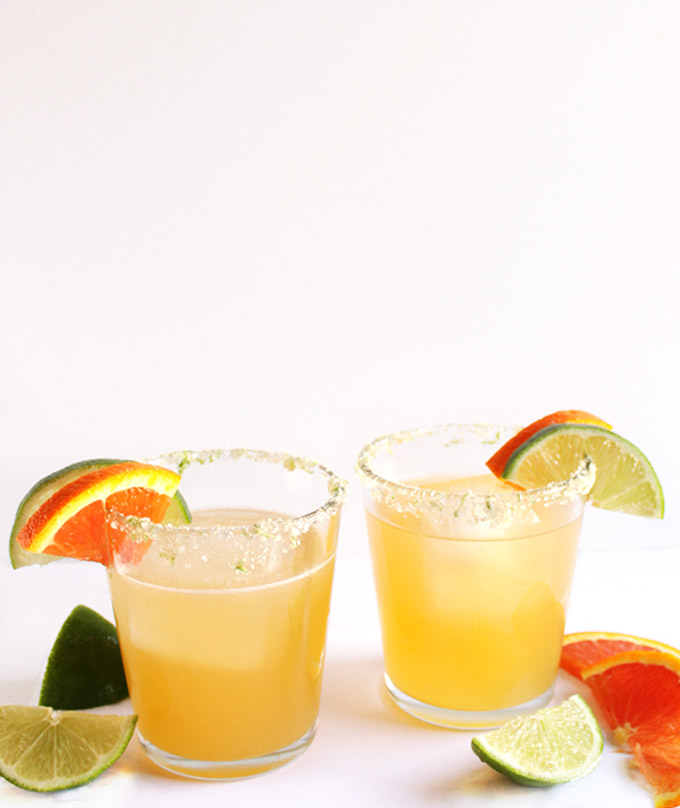 Skinny Orange Lime Margaritas - BEST MARGARITAS EVER! Fresh ingredients: lime juice, orange juice, silver tequila, and agave nectar. EASY to make. Perfect for hot summer day! Vegan/Gluten Free. | robustrecipes.com