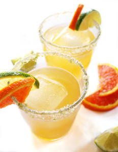 Skinny Orange Lime Margarita - THE BEST MARGARITAS! They are made with fresh ingredients, is naturally sweetened with agave nectar, and is EASY to make. They are rimmed with a salt/sugar/lime mixture which pulls everything together. Vegan/Gluten Free | robustrecipes.com