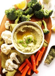 Ranch Hummus - Hummus meets the flavors of ranch. It's a creamy, dreamy hummus with all of the bold ranch flavors! This recipe is EASY to make. It's the perfect addition to your veggie platter! Gluten Free/vegetarian.