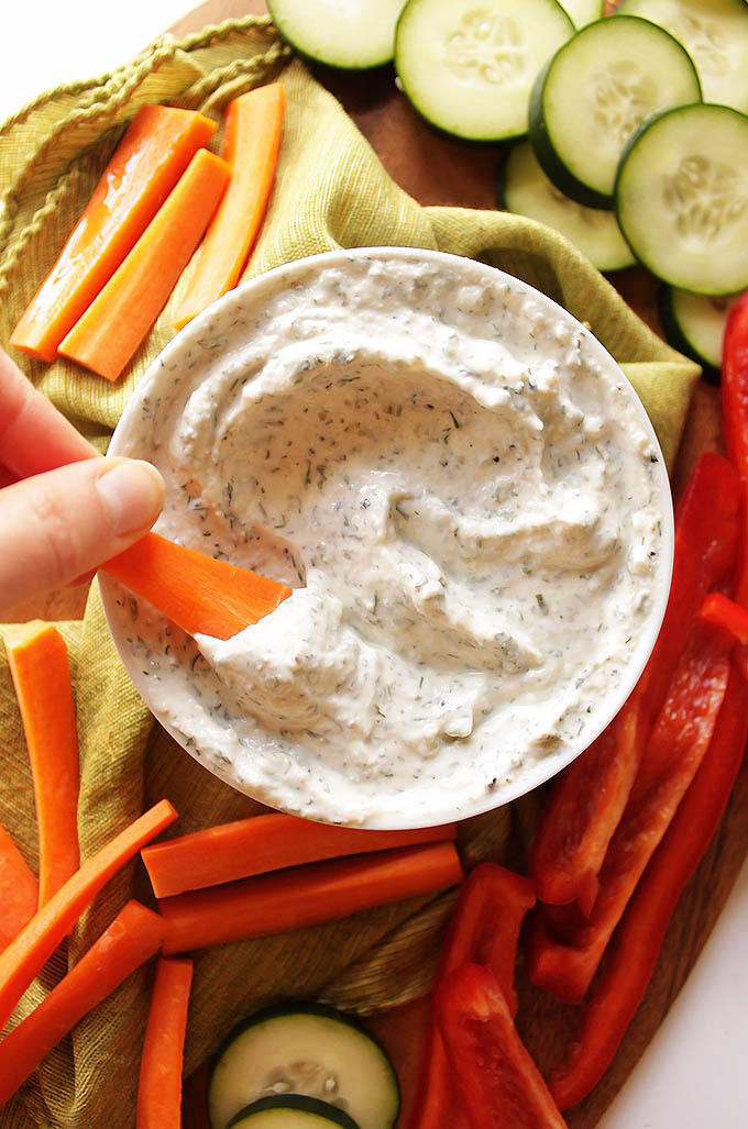 Skinny Ranch Dip - Thick, creamy HEALTHY ranch dip recipe that tastes delicious! It's made with nonfat Greek yogurt that has plenty of protein and live active cultures. It only takes 10 minutes to mix up! Plus it's perfect for any veggie platter! Gluten Free | robustrecipes.com