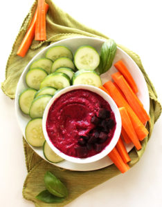 Beet Basil Hummus - Hummus with a twist, sweet beets and loads of fresh basil. This recipe is EASY to make, healthy, and perfect for summer! Vegetarian/Gluten Free.