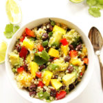 Mango Black Bean Quinoa Salad - A refreshing salad that can be served as the main dish or as a side salad. EASY to make (only 25 minutes), perfect for summer parties.! Quinoa, avocado, mango, black beans, red pepper, cilantro, red onion, jalapeno! Vegan/Gluten Free.