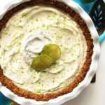 Gluten Free Key Lime Pie - Creamy filling that's sweet and tart with a simple oat and almond crust. This recipe is EASY to make. We love this dessert in the summertime! Vegan/Gluten Free/ refined sugar free.