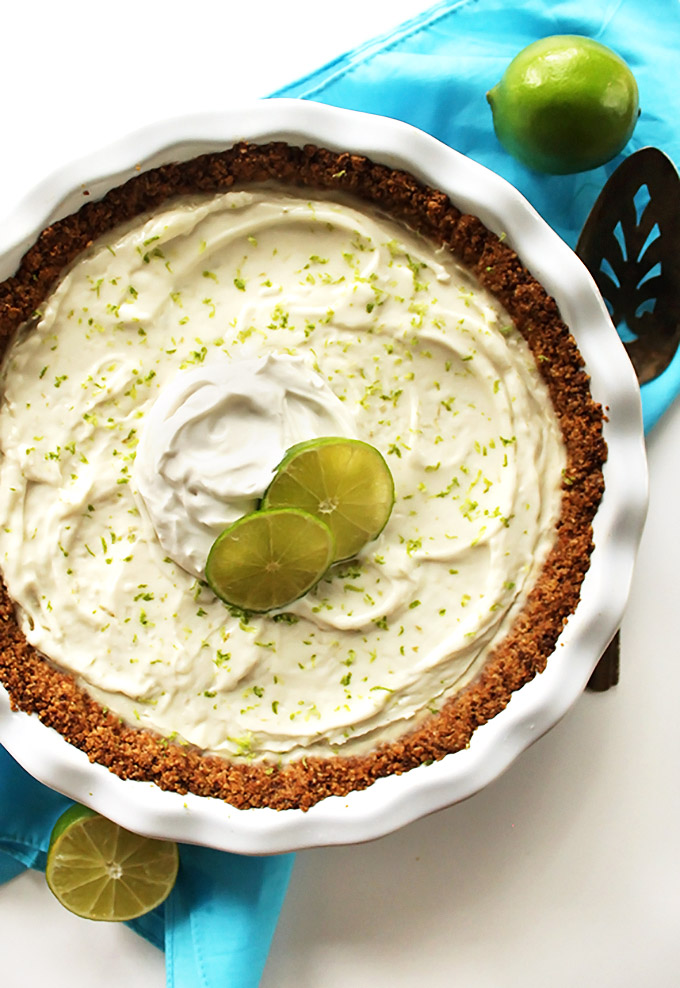 Gluten Free Key Lime Pie - Creamy filling that's sweet and tart with a simple oat and almond crust. This recipe is EASY to make. We love this dessert in the summertime! Vegan/Gluten Free/ refined sugar free.