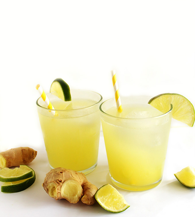 Fresh Moscow Mules - Made with fresh ginger juice, a hint of lime, sweetened with agave nectar and topped with sparkling water! Refreshing and EASY to make! Vegan/Gluten free cocktail recipe!