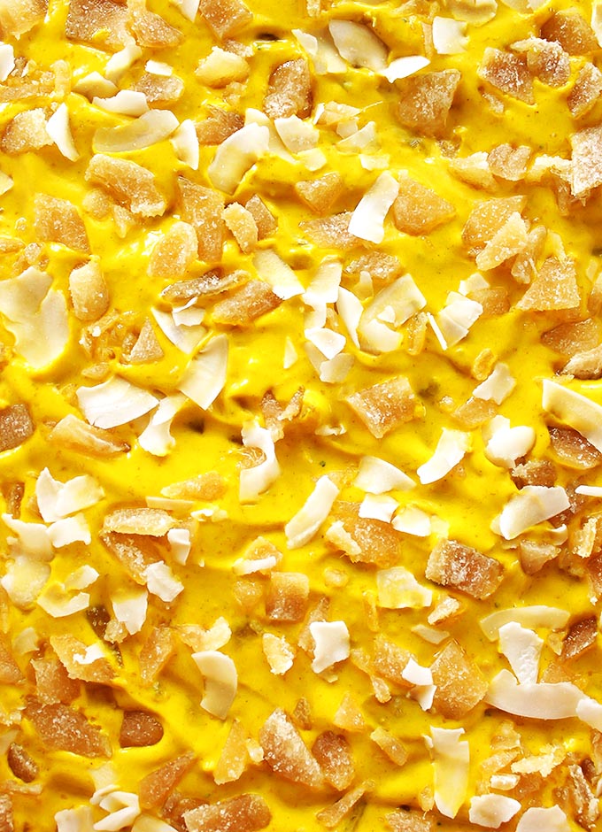 Golden Milk Frozen Yogurt Bark - Inspired by golden milk, this bark is packed with healthy turmeric. It's cold, creamy, nutty, with warming spices and crystallized ginger. This recipe is EASY to make! Perfect for a summer snack. Gluten Free.