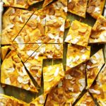Golden Milk Frozen Yogurt Bark - inspired by golden milk this bark is infused with healthy turmeric! It's creamy, nutty, with crystallized ginger for a nice kick! This recipe is easy to make is is perfect for summer! Gluten Free.