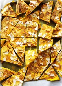 Golden Milk Frozen Yogurt Bark - inspired by golden milk this bark is infused with healthy turmeric! It's creamy, nutty, with crystallized ginger for a nice kick! This recipe is easy to make is is perfect for summer! Gluten Free.
