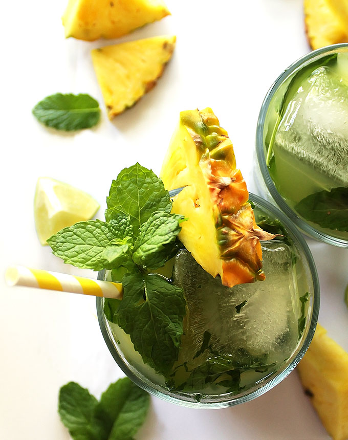 Pineapple Mojitos - These mojitos are slightly sweet, heavy on the mint, with a touch of lime. This recipe is super EASY to make and is ideal for hot summer evenings. refined sugar free / gluten free.