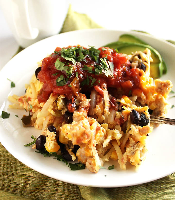 Mexican Crock Pot Breakfast Casserole - An EASY, healthy breakfast casserole that cooks for you over night. A great recipe to feed a crowd, guests or weekly food prep! So yum! gluten free.