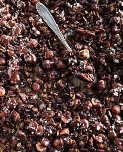 Crunchy Chocolate Hazelnut Granola - Crunchy oats, hazelnuts, and pecans coated in dark chocolate with salted chocolate clusters. So good for snacking or as dessert! This recipe is perfect for fall or winter! gluten free and refined sugar free. | robustrecipes.com