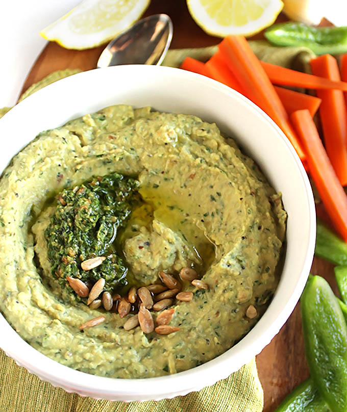 Pesto Hummus - two of the best dips combined! Garlicky fresh basil pesto, mixed with smooth hummus. EASY to make and healthy! We LOVE this recipe! Vegetarian/ gluten free.