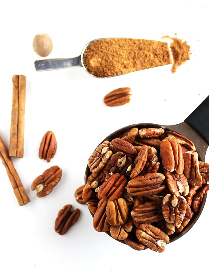 5 Minute Spiced Pecans - Crunchy, sweet, slightly spicy. This recipe is super EASY to make, only requires 7 ingredients! They're the perfect snack, or to add to salads, yogurt, oatmeal. They also make a great edible gift! Vegan/gluten free/refined sugar free | robustrecipes.com