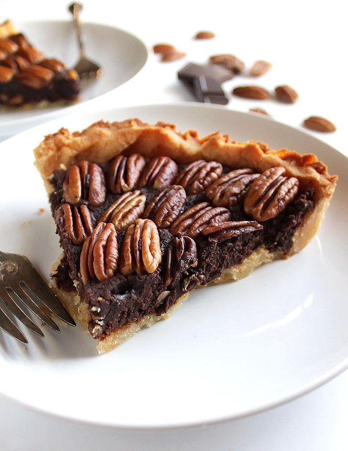 Gluten Free Chocolate Pecan Pie - Rich, fudgey filling with a doughy crust and toasted pecans! This recipe is easy to make and can be made days in advance! It doesn't contain any corn syrup! The perfect dessert for the Holidays! | robustrecipes.com