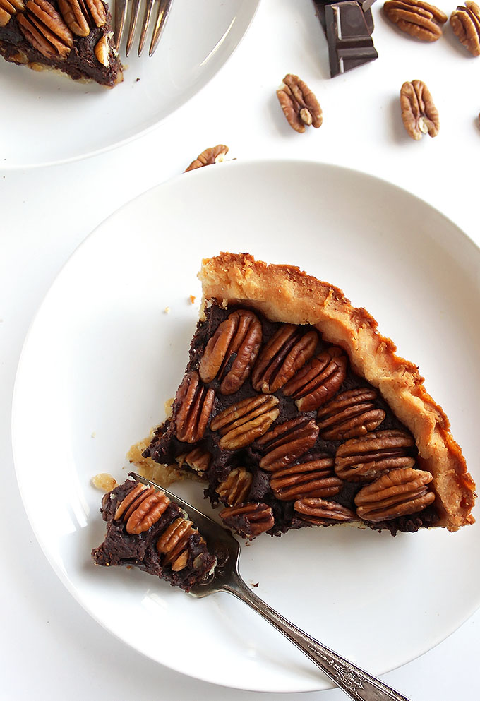 Gluten Free chocolate Pecan Pie - Rich, fudgey center with a doughy crust and crunchy pecans! This recipe doesn't contain corn syrup! It's super EASY to make and can be made days ahead of time. The perfect holiday dessert! | robustrecipes.com