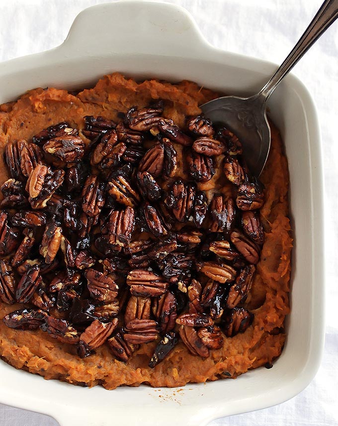 Sweet Potato Casserole with Spiced Pecans - A healthier twist on the traditional marshmallow version. This recipe is EASY to make. Perfect addition to your holiday menu. Vegan/gluten free/refined sugar free | robustrecipes.com