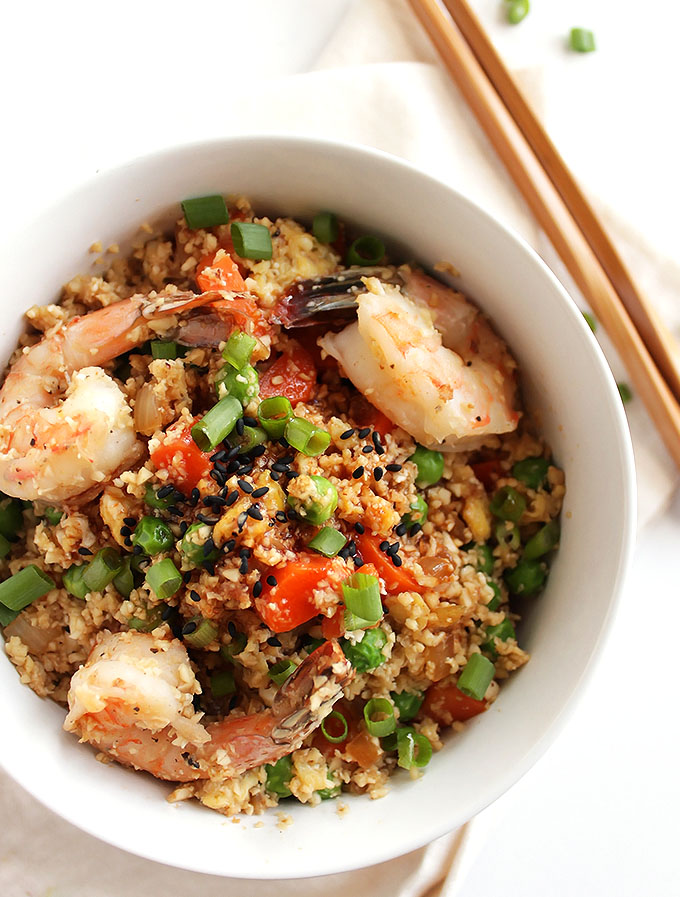 Cauliflower Fried Rice with Shrimp - The perfect weeknight meal! This recipe only takes 30 minutes to make and one pan! A healthier take on traditional fried rice. Packed with veggies! Gluten Free/ Dairy Free | robustrecipes.com