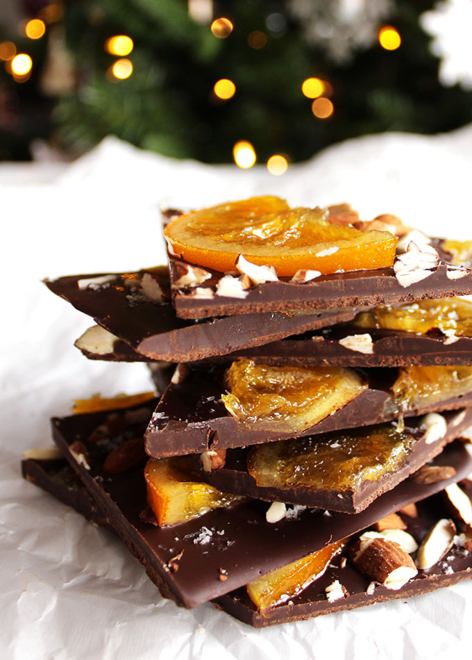 Dark Chocolate Bark with candied oranges - This recipe is so delicious! Smooth dark chocolate topped with almonds, juicy candied oranges, and sea salt! The perfect treat for the holidays! It also makes a great edible gift! Gluten Free | robustrecipes.com
