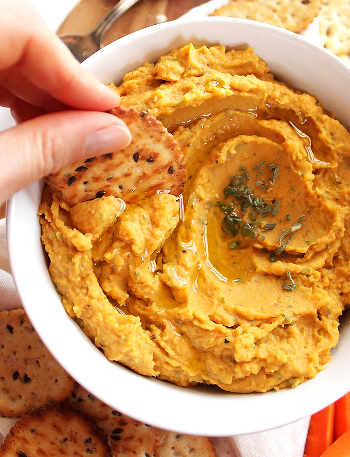 Pumpkin Sage Hummus - A healthy appetizer for fall and winter parties. Perfect balance of sweet and savory! This recipe is EASY to make! So yum! Vegan/Gluten Free/ Vegetarian | robustrecipes.com