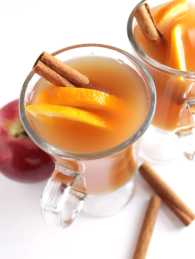 Slow Cooker Apple Cider + Boozy Bar - Delicious, easy fresh hot cider recipe made in the slow cooker! Best hot cider EVER! Make a hot apple cider boozy bar: set out an assortment of hard liquors, juices, cinnamon sticks, caramel sauce etc for guests to customize their own hot cider! Perfect for Halloween, Christmas, or New Year's Eve parties! So much fun! Gluten free/vegan | robustrecipes,com