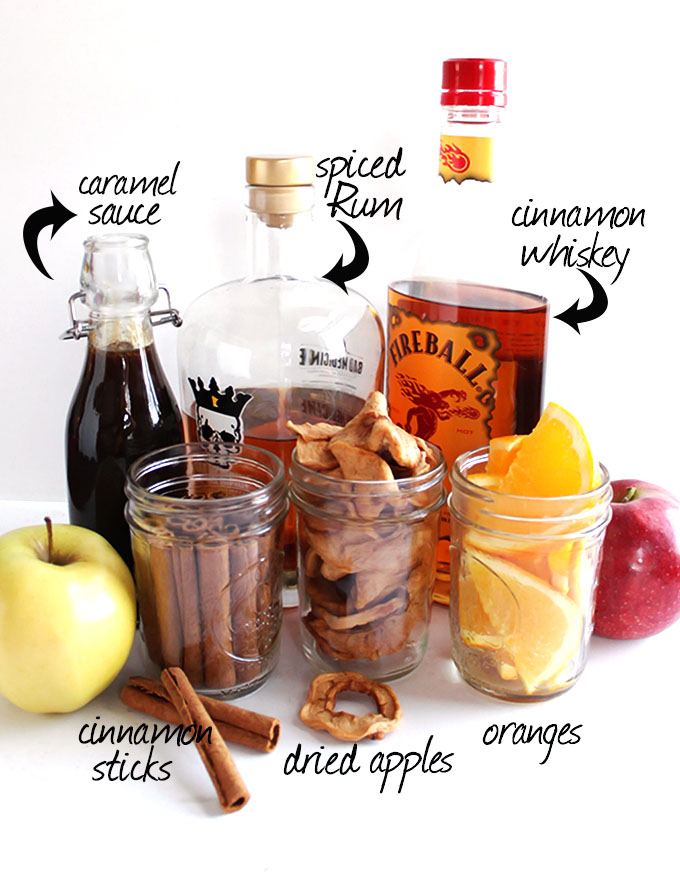 Slow Cooker Apple Cider + Boozy Bar - Perfect for Christmas, Halloween, or even New Year's Eve! Set out a variety of hard liquors, juices, caramel sauce, cinnamon sticks etc for you guests to customize their own glass of hot cider! The apple cider recipe is super EASY to make and super delicious! Gluten free/Vegan | robustrecipes.com
