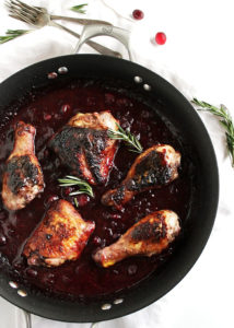 Marinated Cranberry Chicken - This recipe is easy enough for a weeknight dinner! Chicken pieces with crispy skin and a tart cranberry sauce! Serve it with your favorite grain! So Yum! Gluten Free | robustrecipes.com