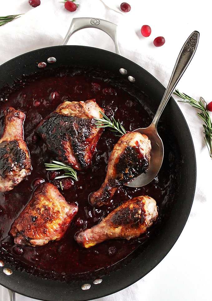 Marinated Cranberry Chicken - Chicken pieces with crispy skin cooked in a tart cranberry/red wine sauce. This recipe is great for a weeknight dinner! Gluten Free | robustrecipes.com