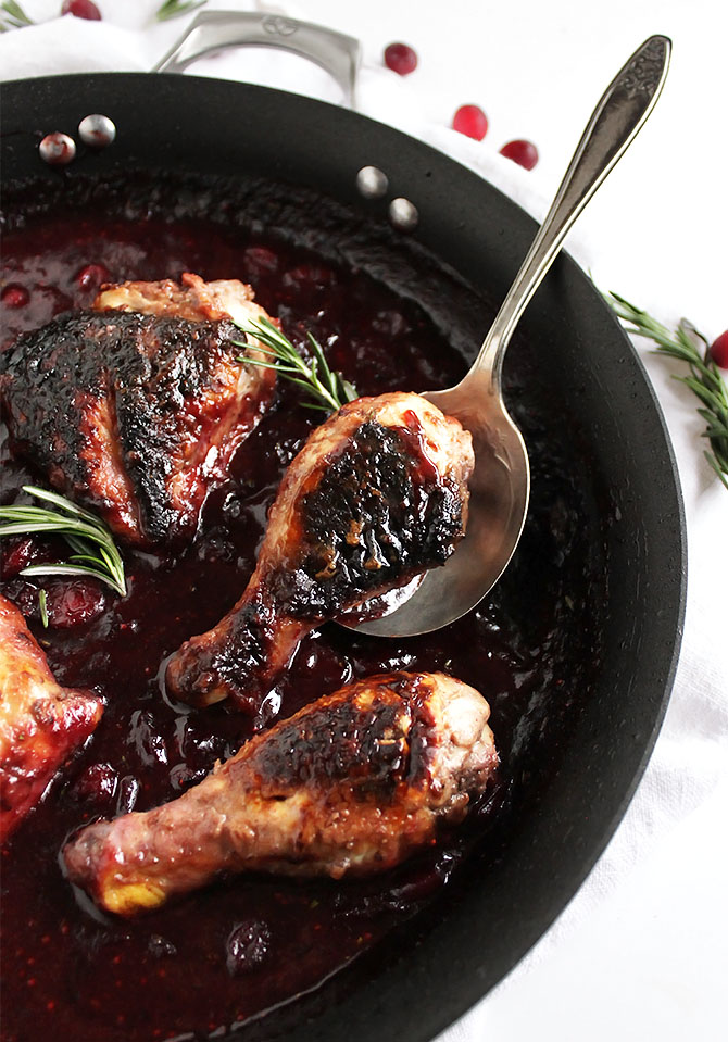 Marinated Cranberry Chicken - Chicken with crispy skin cooked in a tart cranberry sauce. This recipe is perfect for weeknight dinners or meal prep! Gluten Free | robustrecipes.com
