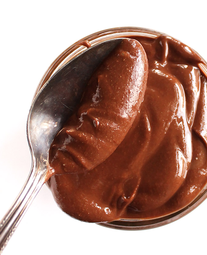 2 Ingredient Homemade Dark Chocolate Peanut Butter - Rich, smooth and creamy. Spread on toast, cookies, fruit, or eat with a spoon! Also makes a great edible gift! This recipe is so EASY to make! Gluten Free/Vegan/Dairy Free | robustrecipes.com