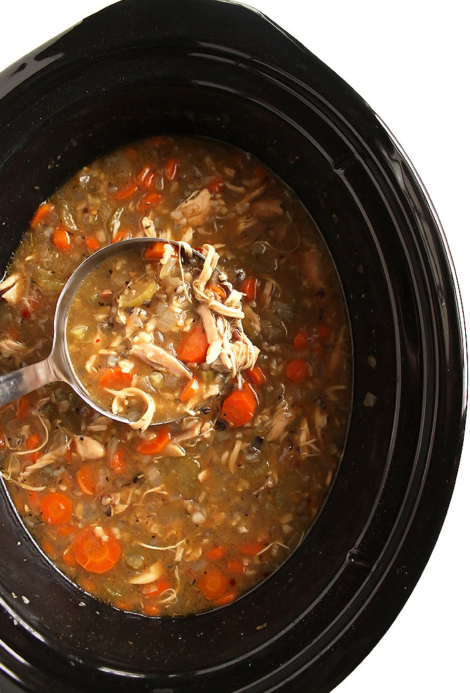 Slow Cooker Chicken and Wilde Rice Soup - This recipe is EASY to make, only requires 8 ingredients and 10 minutes to prep! It's great for when you're sick. Plus it makes a large batch and freezes well. Gluten Free/Dairy Free | robustrecipes.com