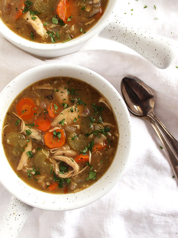 Slow Cooker Chicken and Wild Rice Soup - Perfect for when you are sick or want comfort food! This recipe is EASY to make: 8 simple ingredients and only 10 minutes to prep! It makes a large batch and freezes well. Nutritious, healing, and delicious! Gluten Free/Dairy Free | robustrecipes.com