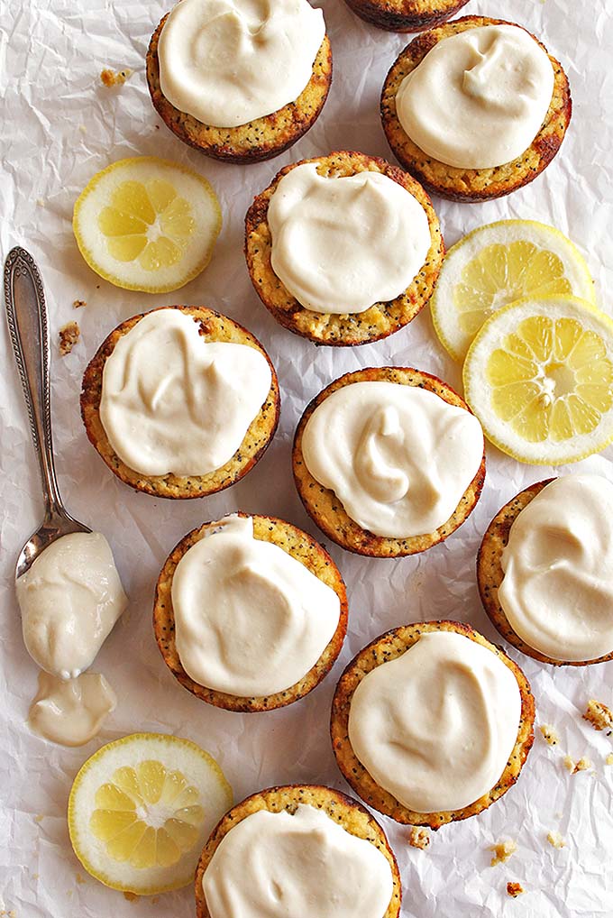Grain Free Lemon Poppy Seed Muffins - Fluffy, lemon-y muffins topped with a tangy cashew glaze. This recipe is perfect for parties, brunch, or breakfast. These are some of our fave muffins! Gluten Free/Dairy Free/ Grain Free/ Refined Sugar Free | robustrecipes.com