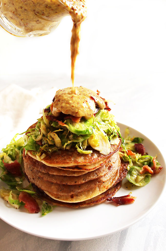 Irish Boxty Potato Pancakes with Brussels Sprouts and Bacon - Tender, fluffy pancakes topped with warmed shredded Brussels sprouts, crispy bacon, and a honey mustard sauce! This recipe is based off a traditional Irish recipe. Perfect for St. Patrick's day or a brunch party!!! Gluten Free | robustrecipes.com