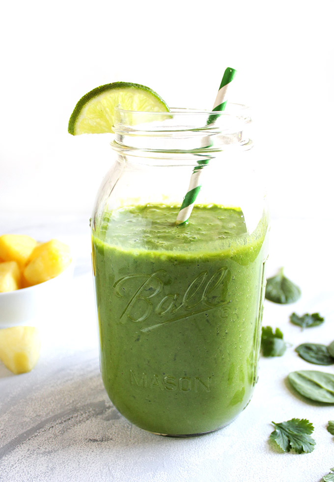 Super Green Pineapple Lime cilantro Smoothie - Refreshing, sweet, and tangy. This recipe is packed with detoxifying ingredients and antioxidants: spinach, pineapple, ginger, lime, bananas, cilantro. This smoothie recipe is one of our favorites!!! Vegan/Gluten Free/Dairy Free/Refined sugar free | robustrecipes.com