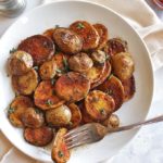 These potatoes are perfect for a weekend breakfast or a brunch table. This recipe is easy to make, only need 1 pan, 5 ingredients and 25 minutes to make. They are crispy on the outside and tender and creamy on the inside. Plus the spices make them smoky and super flavorful! Gluten Free/Vegan | robustrecipes.com