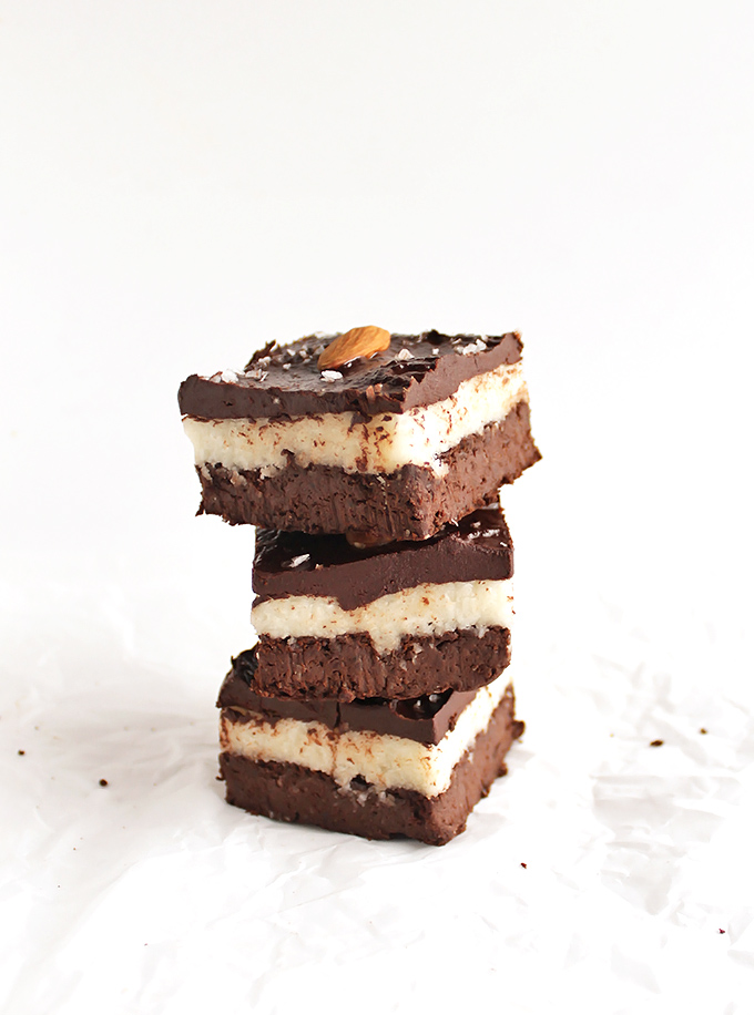Almond Joy Black Bean Brownies - A fudge-y brownie layer topped with a sticky coconut layer, topped with a ganache layer and almonds. This recipe is amazingly delicious! It's rich, satisfying, and surprisingly healthy - healthy fats and fiber! Gluten Free/Vegan/Refined Sugar Free | robustrecipes.com
