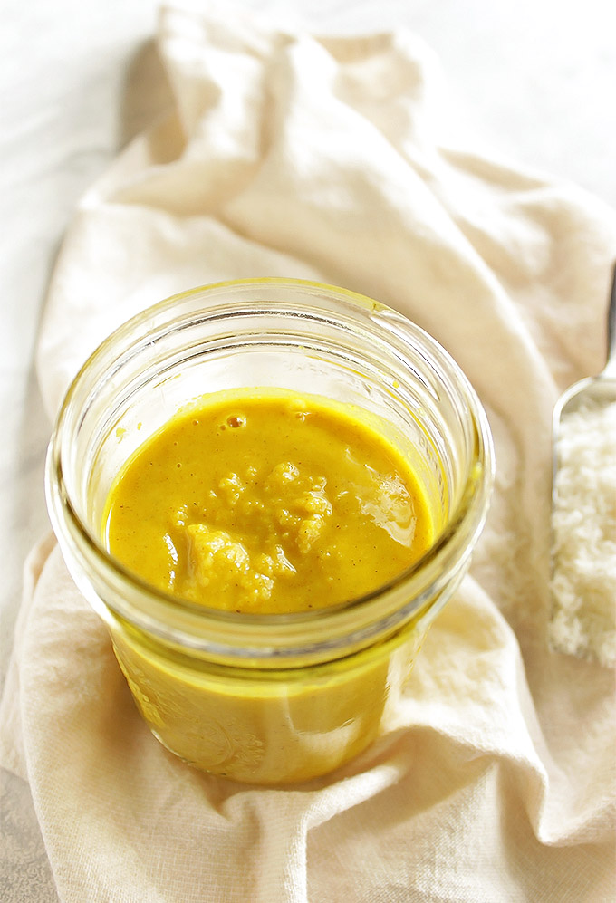 Golden coconut butter (5 Ingredients) - Rich creamy coconut butter with a hint of warming, turmeric and honey for sweetness. Inspired by the amazing turmeric milk. This recipe is easy to make, only requires 5 ingredients and 15 minutes. Spread it on toast, swirl it into yogurt or oatmeal, spread it on chocolate, or just eat it plain - So YUM! Vegan/gluten free/ refined sugar free | robustrecipes.com