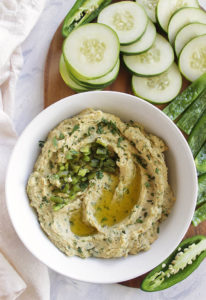 Roasted chili pepper hummus is studded with roasted poblano pepper, roasted jalapeno, and fresh cilantro. Serve it with cucumbers, bell peppers, or chips. Perfect recipe for a side, snack, appetizer and for taking to parties. Gluten Free/Vegan | robustrecipes.com